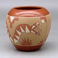 A polychrome jar decorated with a sgraffito and painted avanyu, lizard and geometric design
 by Lawrence Dili of Ohkay Owingeh