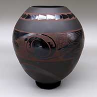 Red-on-black jar with a geometric design and polished and matte textures
 by Lydia Quezada of Mata Ortiz and Casas Grandes