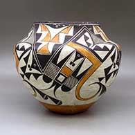 A polychrome jar decorated with a four panel bird element and geometric design, click or tap to see a larger version