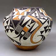 A polychrome jar decorated with a four panel bird element and geometric design, click or tap to see a larger version