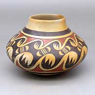 A polychrome jar decorated around the body with a migration pattern design
 by Leah Nampeyo of Hopi