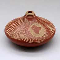 A low shouldered red seed pot decorated above the shoulder with a bighorn ram in medallion, spiral and geometric design
 by Glendora Fragua of Jemez