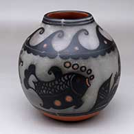 A polychrome jar decorated with a fish, plant and geometric design, plus fire clouds
 by Thomas Tenorio of Santo Domingo