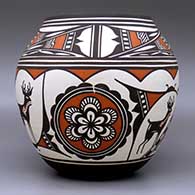 A polychrome jar decorated with a four-panel deer-in-his-house, rosette and geometric design, click or tap to see a larger version