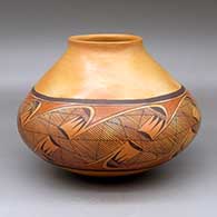 A polychrome low-shoulder jar decorated around the shoulder with a migration pattern design
 by Priscilla Namingha of Hopi