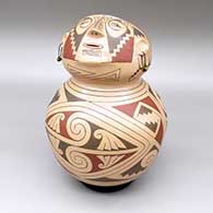 Polychrome effigy jar with a geometric design and stone earring details
 by Jose Andres Villalba of Mata Ortiz and Casas Grandes
