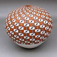 A large polychrome seed pot decorated with a classic checkerboard, basketweave and lightning bolt design
 by Grace Chino of Acoma