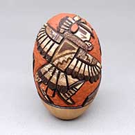 Polychrome seed pot with a lightly carved and painted dancer and geometric design
 by Carla Nampeyo of Hopi