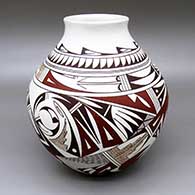 Polychrome jar with a slightly flared opening and a geometric design
 by Maynard Navasie of Hopi