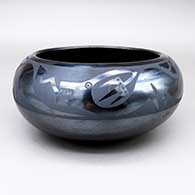 Black-on-gunmetal bowl with an avanyu and raincloud geometric design
 by Maria Martinez of San Ildefonso