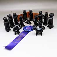 A 17 piece black on black Dineh nativity set, First Prize ribbon from Santa Fe Indian Market 1980
 by Dorothy and Paul Gutierrez of Santa Clara
