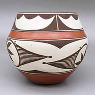 Polychrome bowl with a geometric design, click or tap to see a larger version