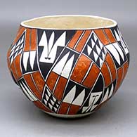 A polychrome jar decorated with a four-panel geometric design
 by Unknown of Acoma