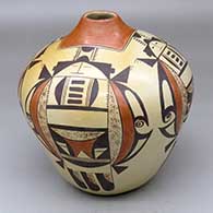 A polychrome jar decorated with a four-panel water beetle katsina, bird element and geometric design
 by Vernida Polacca of Hopi