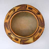 A polychrome bowl decorated above the shoulder with an eight-panel geometric design
 by Unknown of Hopi