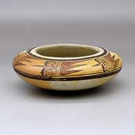 A polychrome bowl decorated above the shoulder with a six-panel geometric design
 by Unknown of Hopi