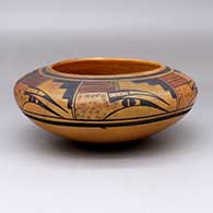 A polychrome bowl decorated around and above the shoulder with a six-panel bird element and geometric design, has a Fred Harvey Hopi Villages tag
 by Unknown of Hopi