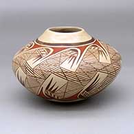 A polychrome jar decorated with a migration pattern design
 by Adelle Nampeyo of Hopi