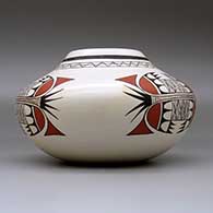 A polychrome jar with fire clouds and decorated with a three-panel bird element and geometric design, click or tap to see a larger version