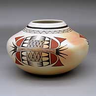 A polychrome jar with fire clouds and decorated with a three-panel bird element and geometric design
 by Dawn Navasie of Hopi