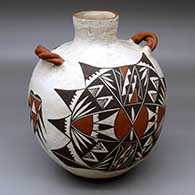 A polychrome jar with twisted handles and decorated with a four-panel geometric design
 by Miriam Davis of Laguna