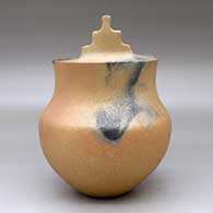 A lidded golden micaceous pot decorated with fire clouds, click or tap to see a larger version