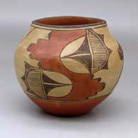 A polychrome jar decorated with a four-panel geometric design around the body
 by Unknown of Zia