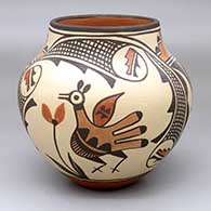 A polychrome jar with a four-panel road-runner, flower and geometric design
 by Elizabeth Medina of Zia