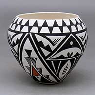 A polychrome jar decorated with a three panel geometric design
 by Debbie Brown of Acoma