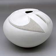 A white seed pot decorated with a corrugated geometric applique and handles, click or tap to see a larger version