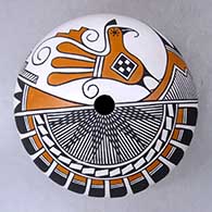 A polychrome seed pot decorated with a parrot, fineline, feather, spiral and geometric design
 by Robert Patricio of Acoma
