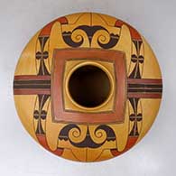 Click for a larger view A polychrome jar decorated above the shoulder with a four-panel bird element and geometric design
by Jacob Koopee of Hopi
