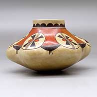 A polychrome melon jar with six repousse ribs and decorated with a geometric design above the shoulder, click or tap to see a larger version