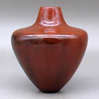 A high-shouldered brown jar decorated with fire clouds, click or tap to see a larger version