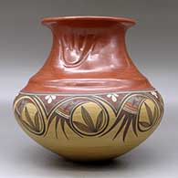 A polychrome double shouldered jar with a rolled lip decorated with three bear paw imprints around the neck and a painted geometric design around the shoulder, click or tap to see a larger version