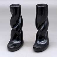 A pair of black coiled candlestick holders
 by Margaret Tafoya of Santa Clara