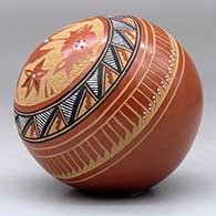 A polychrome seed pot decorated with a sgraffito and painted medallion, hummingbird, flower, and geometric design, with an inlaid stone, click or tap to see a larger version