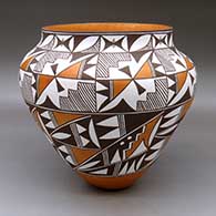 A large, high-shouldered jar decorated with a four-panel geometric design
 by Loretta Joe of Acoma