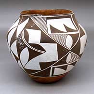 A polychrome jar decorated with a four-panel geometric design
 by Unknown of Acoma