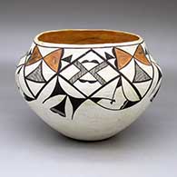 A polychrome jar decorated with a four-panel geometric design
 by Unknown of Acoma