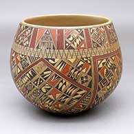 A polychrome bowl decorated with a four-panel small sherd and geometric design
 by Rondina Huma of Hopi