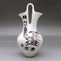 A polychrome wedding vase decorated with a two-panel bird element and geometric design, click or tap to see a larger version
