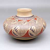 A polychrome jar with a raised rim and decorated with a migration pattern design
 by James Nampeyo of Hopi