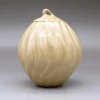 A lidded tan melon jar with 18 repousse ribs, click or tap to see a larger version