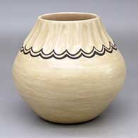 A brown-on-tan jar with a fluted neck and geometric design
 by Juanita Fragua of Jemez
