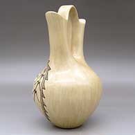 A black-on-tan wedding vase decorated on one side with a pueblo, cornstalk and geometric design, click or tap to see a larger version