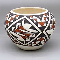 A polychrome jar decorated with a four-panel geometric design
 by Sherrel Pedro of Laguna