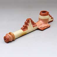 A polychrome pipe decorated with cloud pattern designs
 by Lucy McKelvey of Dineh