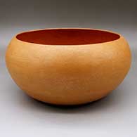 A large, open, golden micaceous bowl
 by Lucy McKelvey of Dineh