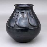 A black jar with a flared rim and decorated above the shoulder with a band-of-feathers and geometric design
 by Cookie Tafoya of Santa Clara